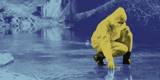 A person in boots and PPE bends down to collect a water sample from a stream. The person is stylized in yellow, while the rest of the image is tinted dark blue.