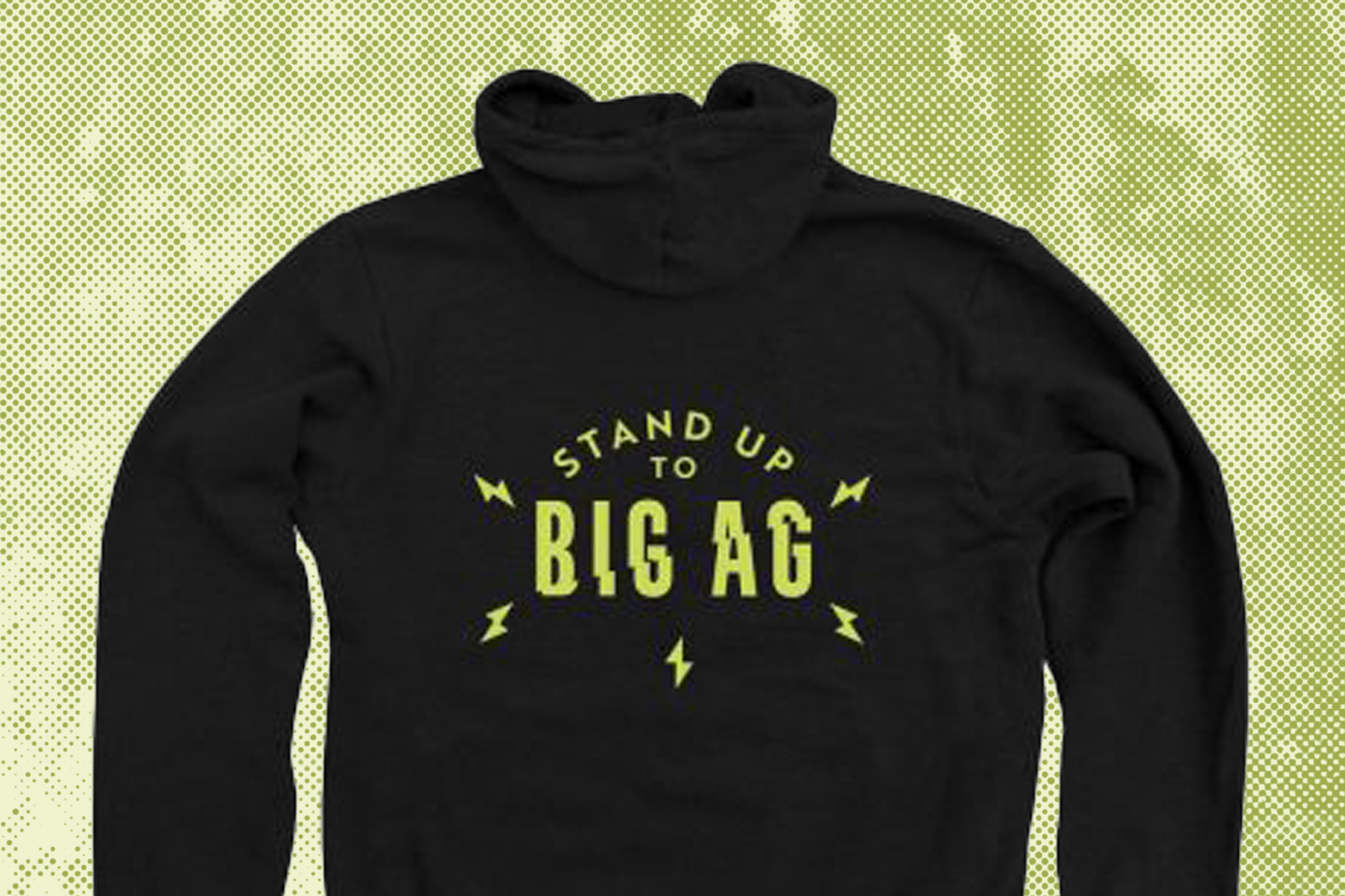 Una sudadera negra con letras verdes que dicen "stand up to Big Ag"